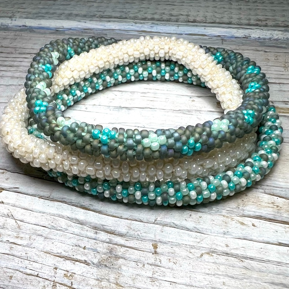👀🆕 Set of three awesome roll on bracelets. Perfect to add a pop of color! ❤️